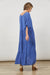 side view of Euphoria Azure Blue button V-neck tiered maxi dress with long sleeves rolled up in a tab from Isle of Mine