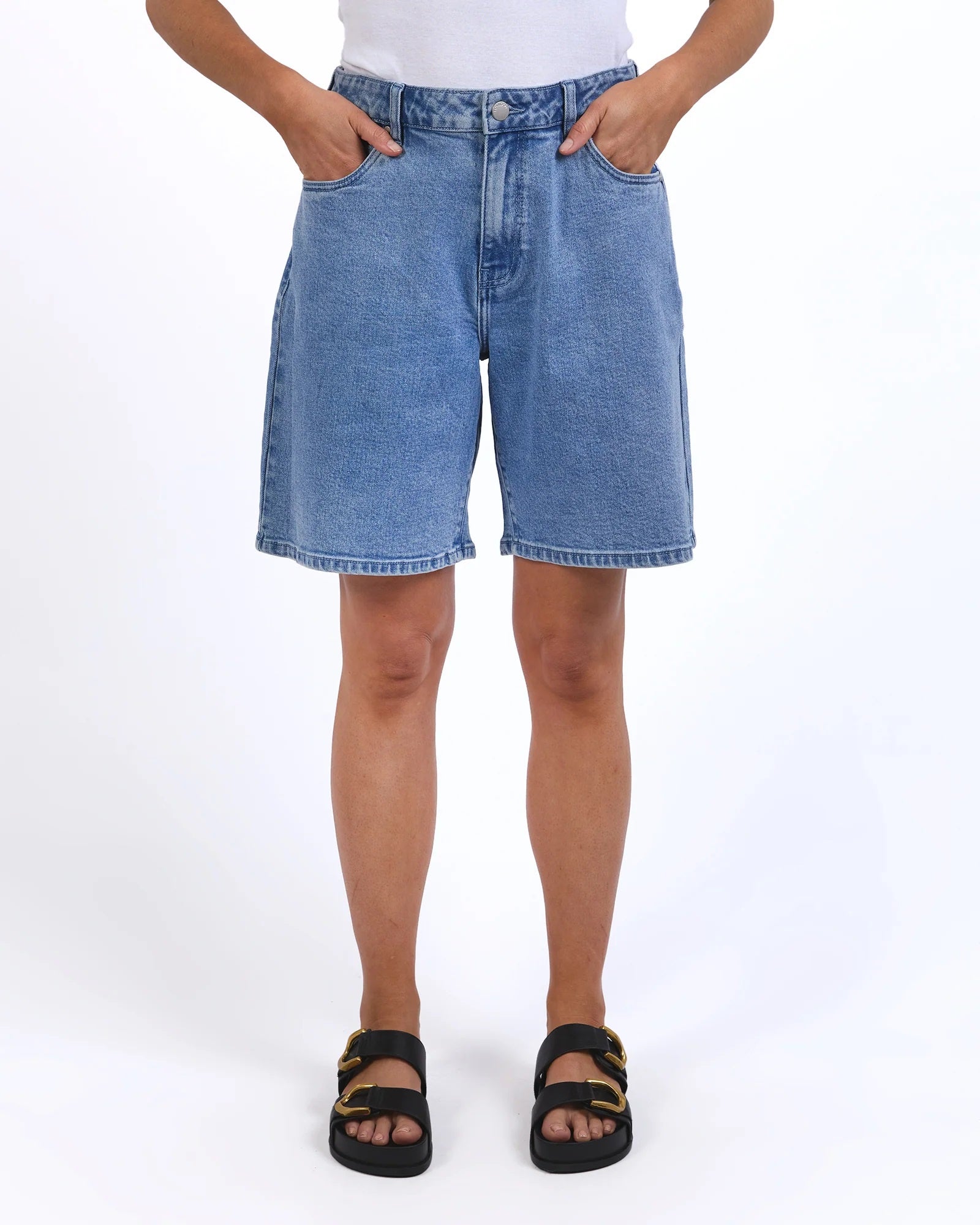 Model Wearing Harley Light Blue Denim Shorts in a longer length.