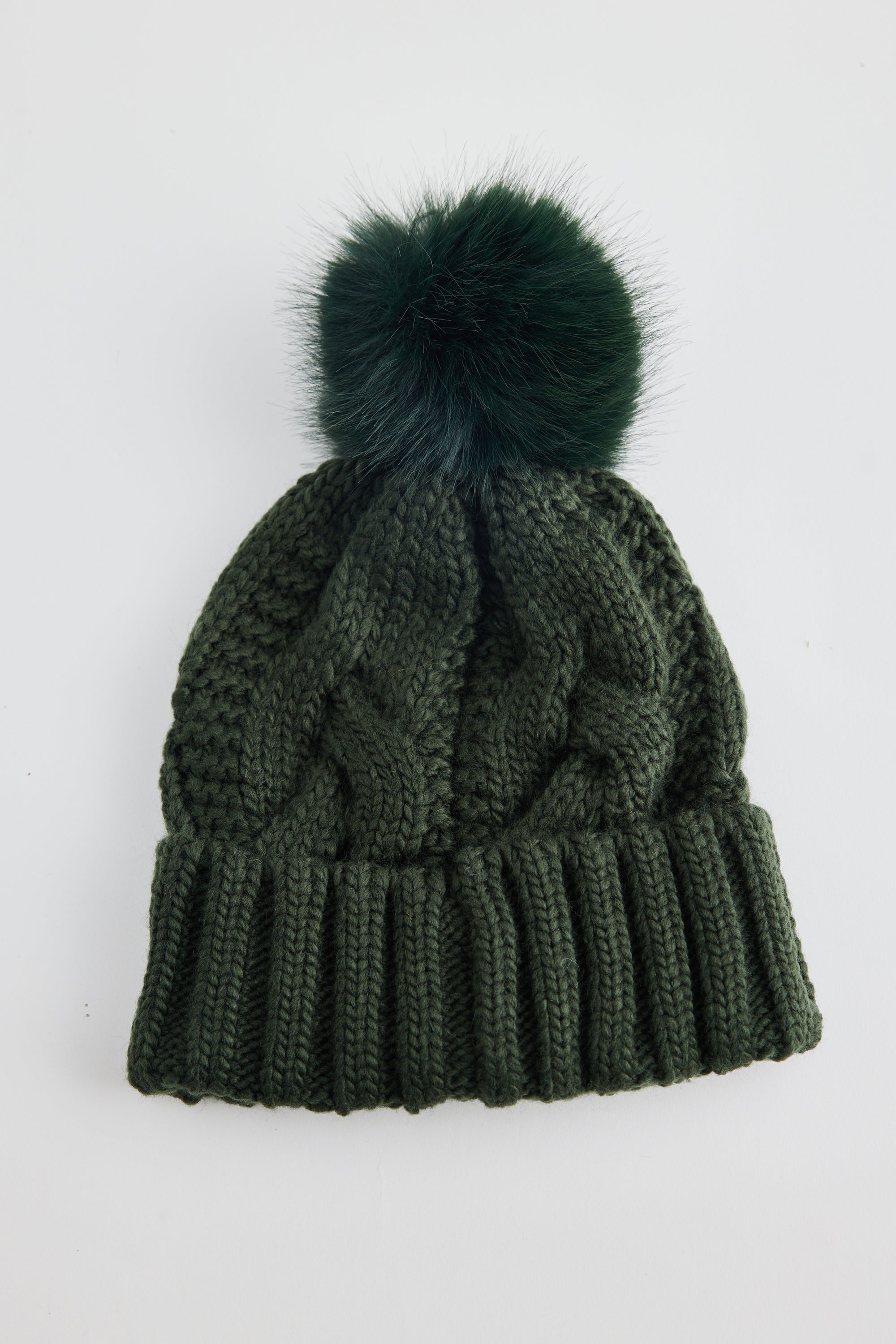 Cable knit Frosty Beanie in Khaki Green with faux fur pom pom by Holiday