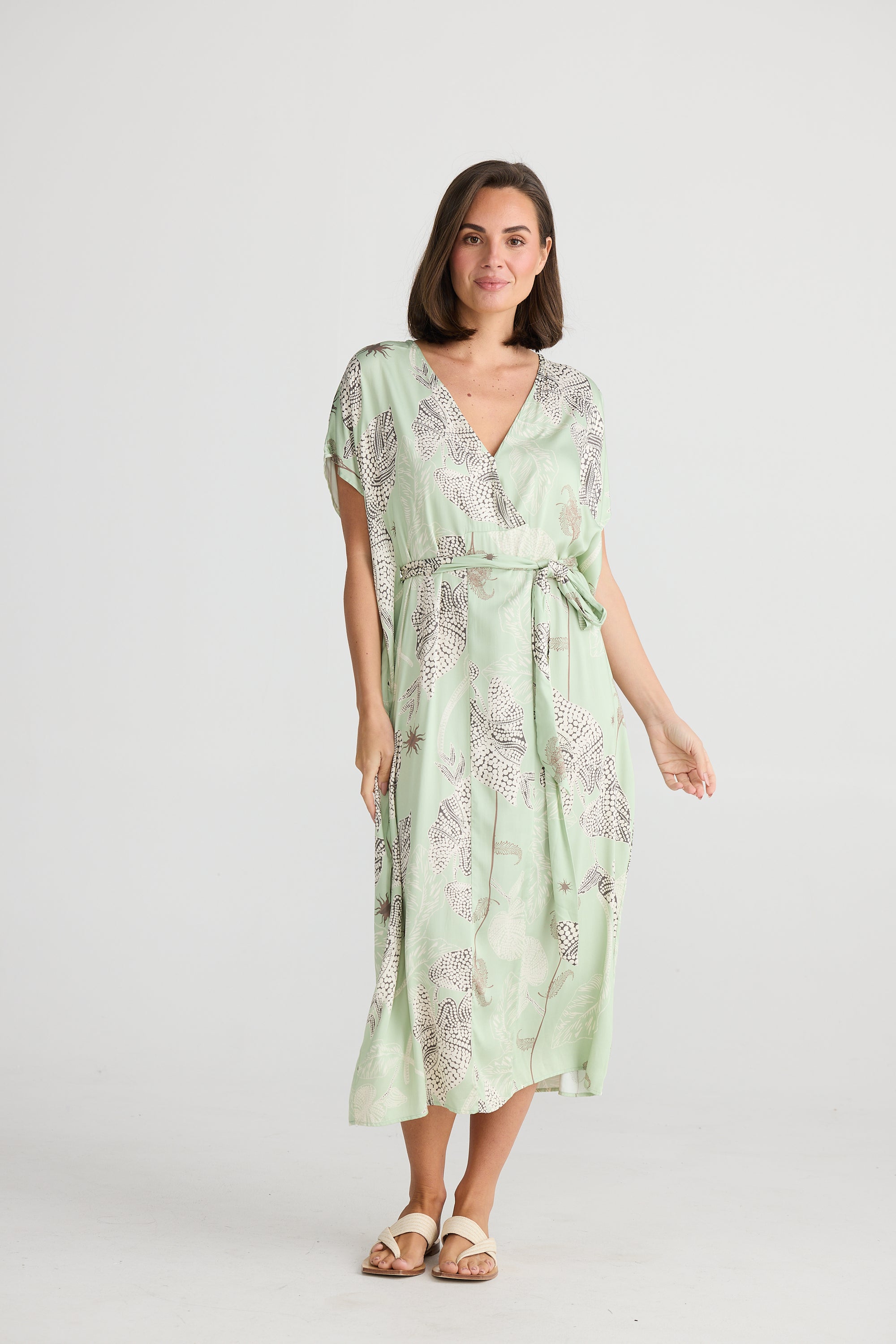 Model wearing Cayman Maxi Dress in waterlily by Holiday Trading.