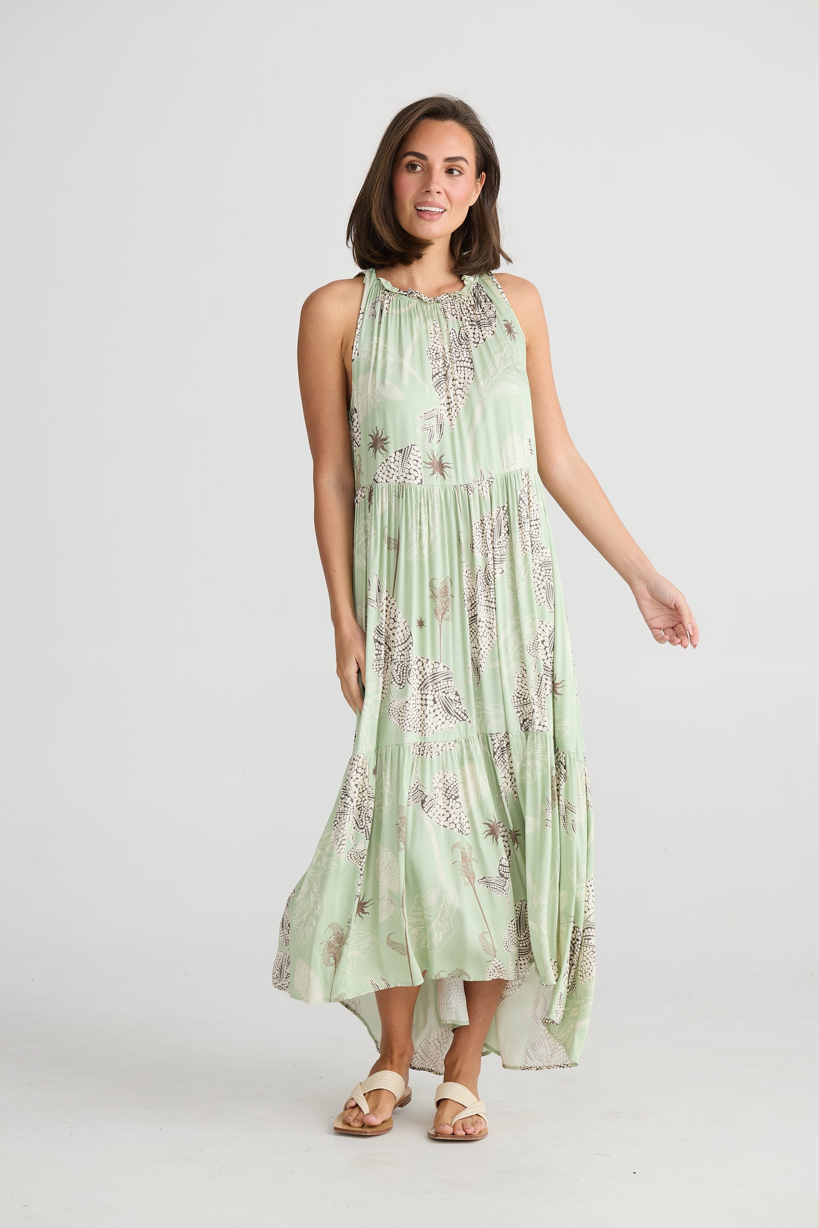 Model wearing Holiday Trading Margot Sleeveless Maxi Dress in Waterlily.