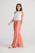 Side of women's disco palm Playa wide leg trousers in pink and red by Holiday.