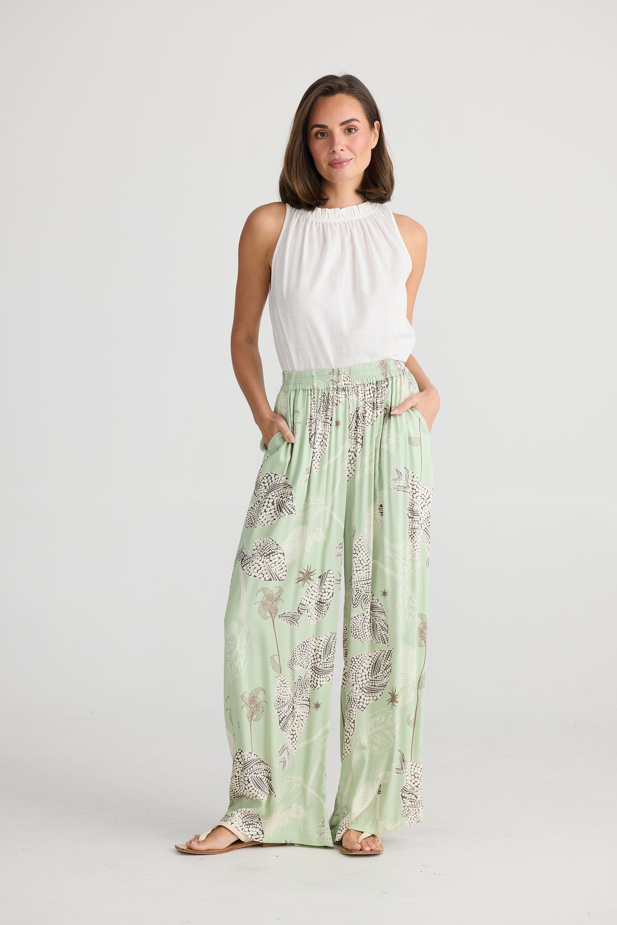 Model wearing Holiday&#39;s Ladies Playa Pants in Waterlily (Green).