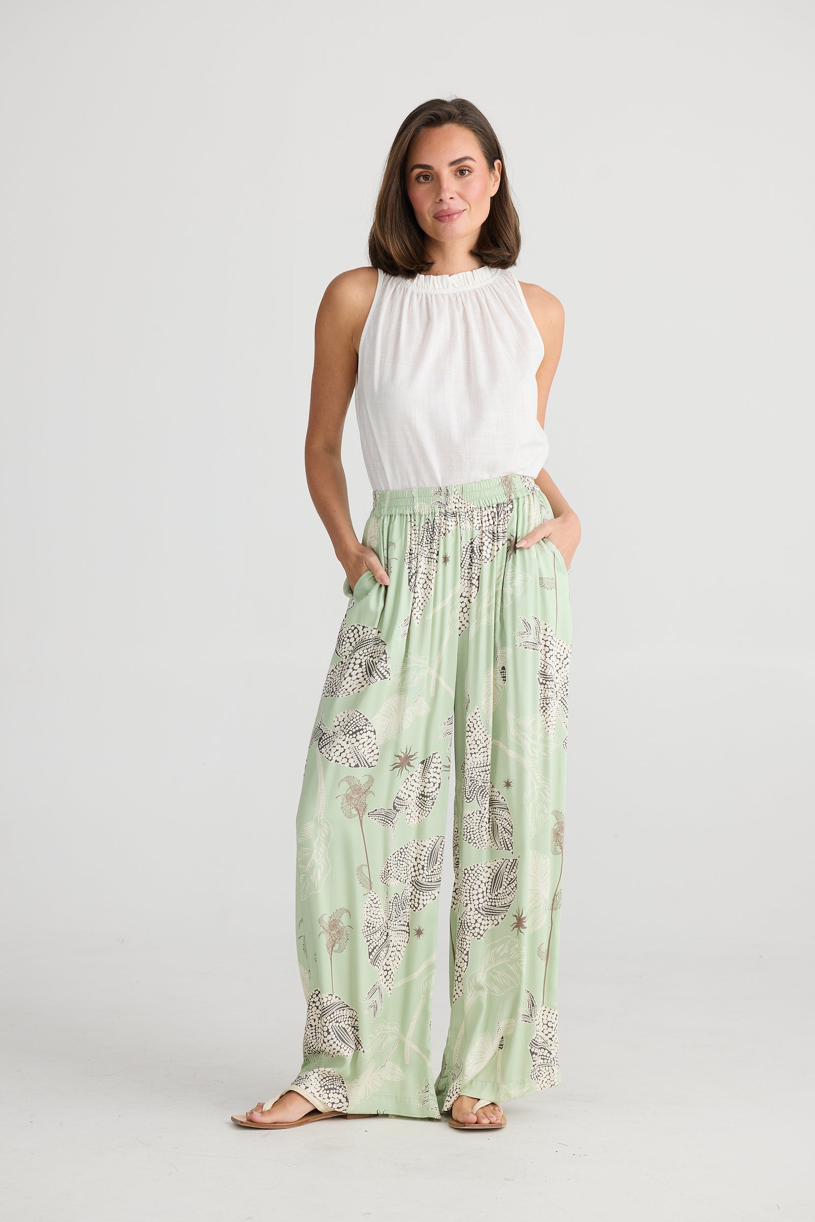 Model wearing Holiday's Ladies Playa Pants in Waterlily (Green).