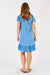 Women's Mimi Shirred Midi Dress in Periwinkle Blue with short sleeves and a large ruffle hem by LulaLife. 