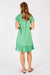 Women's Mimi Shirred Midi Dress in Sea Green with short sleeves and a large ruffle hem by LulaLife. 