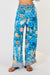 Amalfi summer trousers in blue, white, yellow flower and geometric print with elasticated waist and are full length.