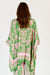 Back of pink and green leaf scarf style print of Carara kaftan shirt by LulaSoul. 