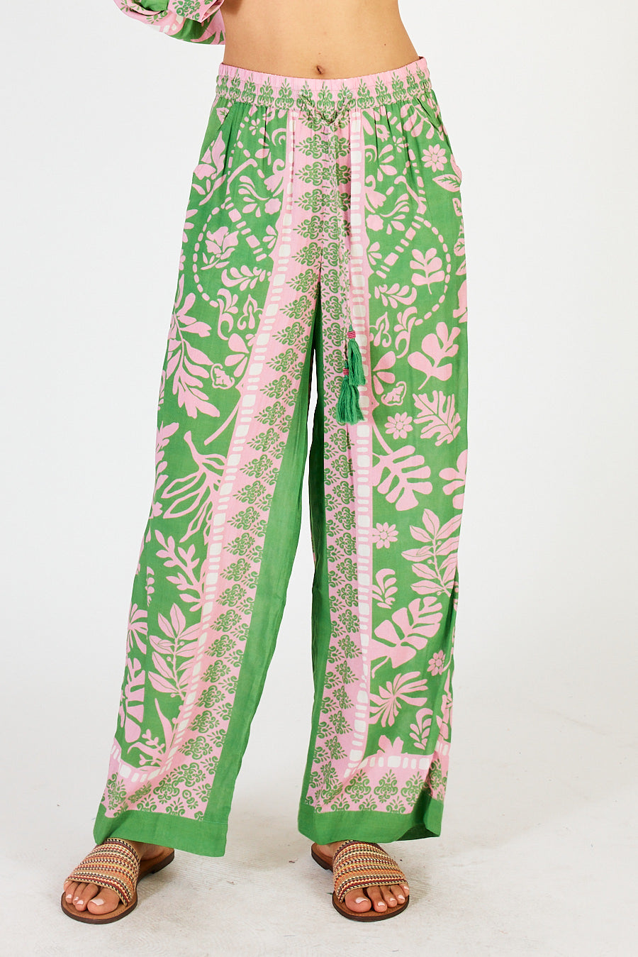 Carara Pants by LulaSoul in Green and Pink leaf scarf style print.