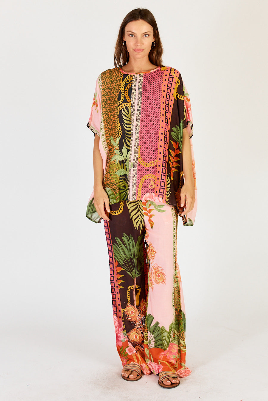 LulaSoul Ravello Pants in Blush with a tropical print.