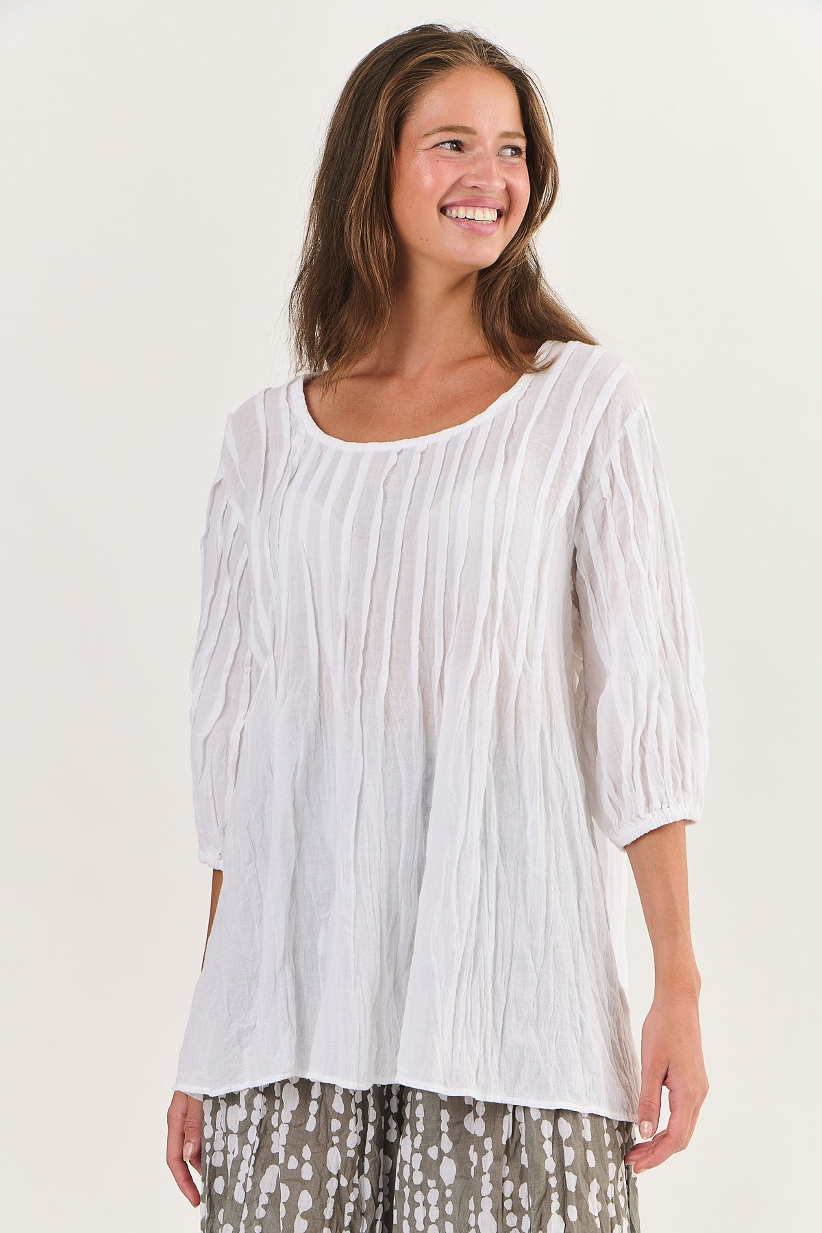 Ladies Namastai Pink Tuck Tunic Top in White.