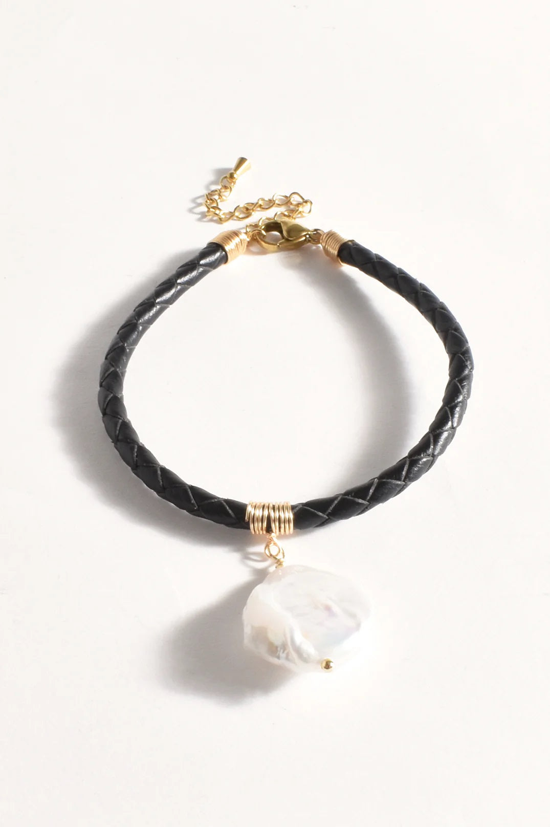 Ladies Black Plaited Leather Bracelet with a Pearl Drop by Adorne.