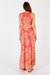 Back of LulaSoul's Monaco sleeveless maxi dress in Geranium orange and pink star print. 