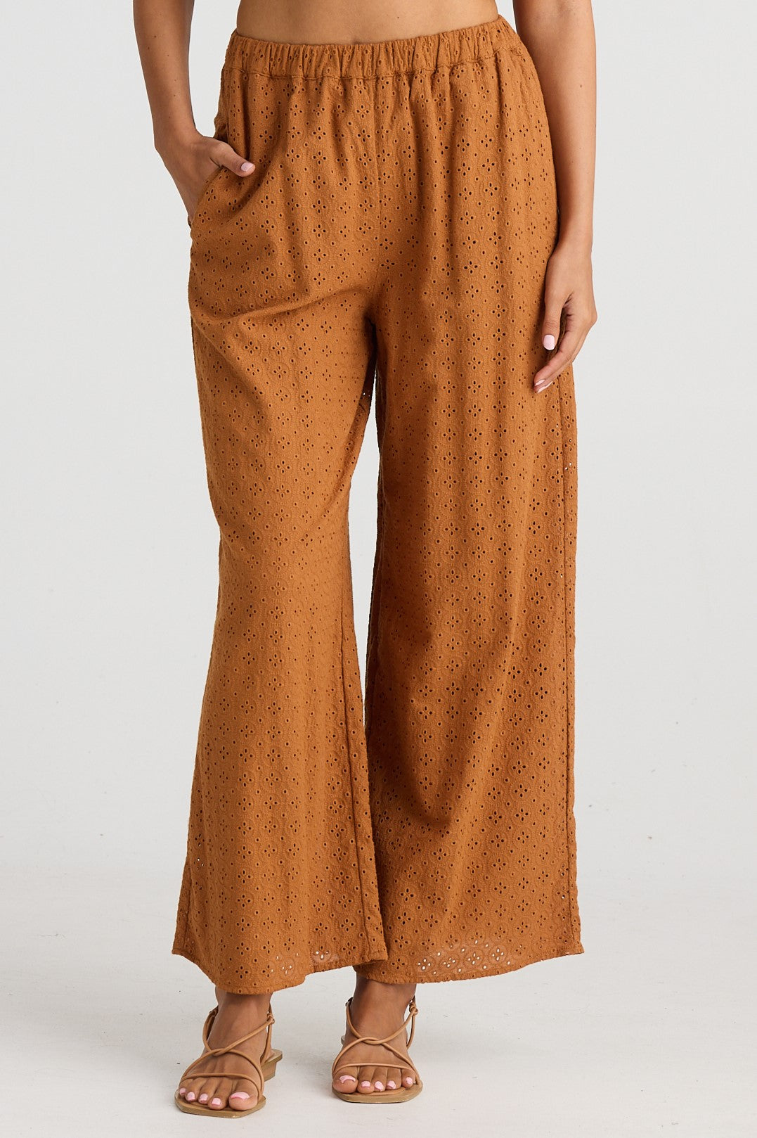 Tan Brown Cotton Pants with eyelet embroidery in a relaxed fit with an elasticated waist.