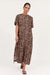 Adorne's Ryan Luxe Cupro Maxi Dress in Leopard Print.