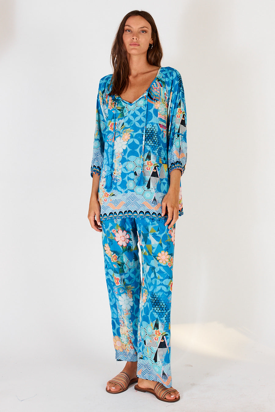 LulaSoul&#39;s lightweight Amalfi Pants in blue, white, orange floral and geometric print.