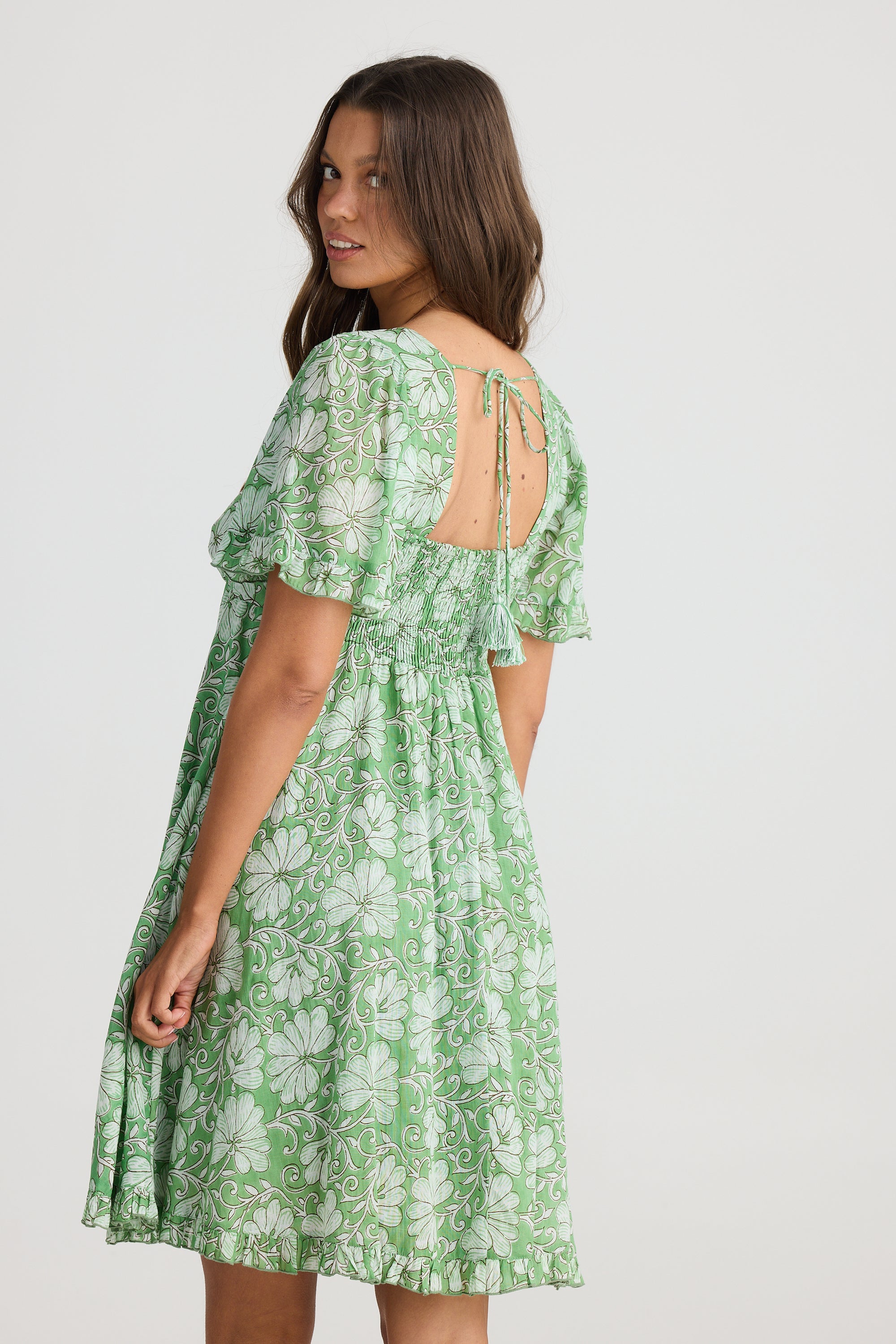 Short relaxed sleeves on this green and white floral midi Tea Party Dress from Talisman.