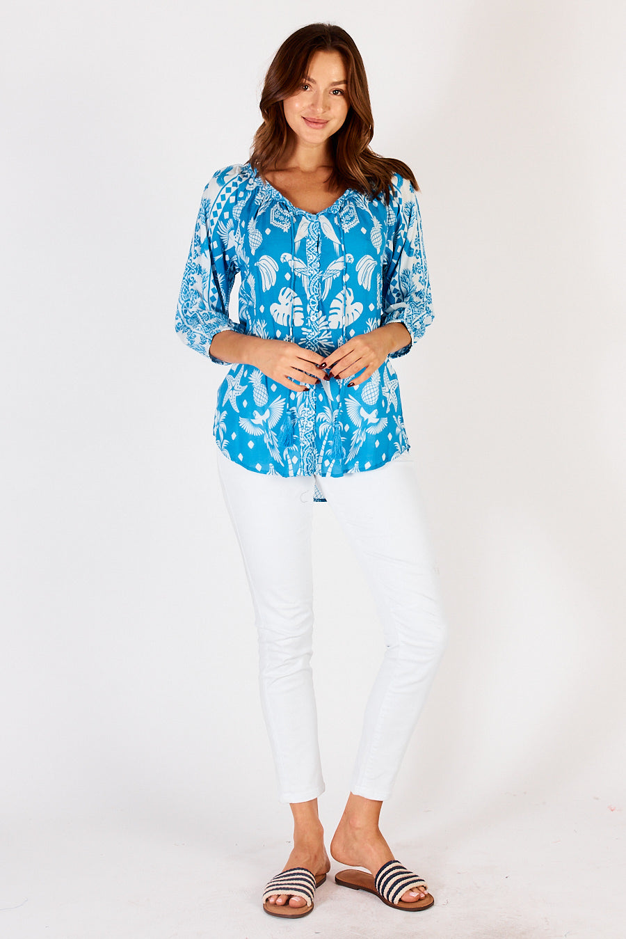 LulaLife Agatha Top in Ocean a blue and white bird and tropical print blouse.