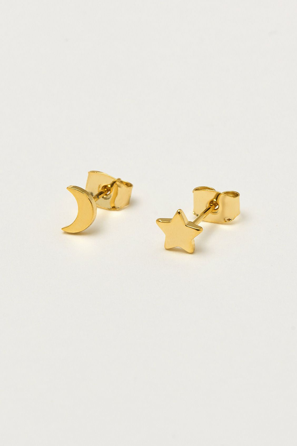 Mixed Moon and Star Earrings in Gold Plating by Estella Bartlett.