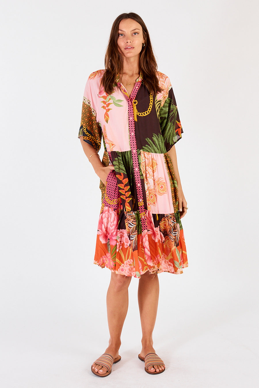 Midi Dress in pink, brown, red, yellow, orange with feathers and flowers.