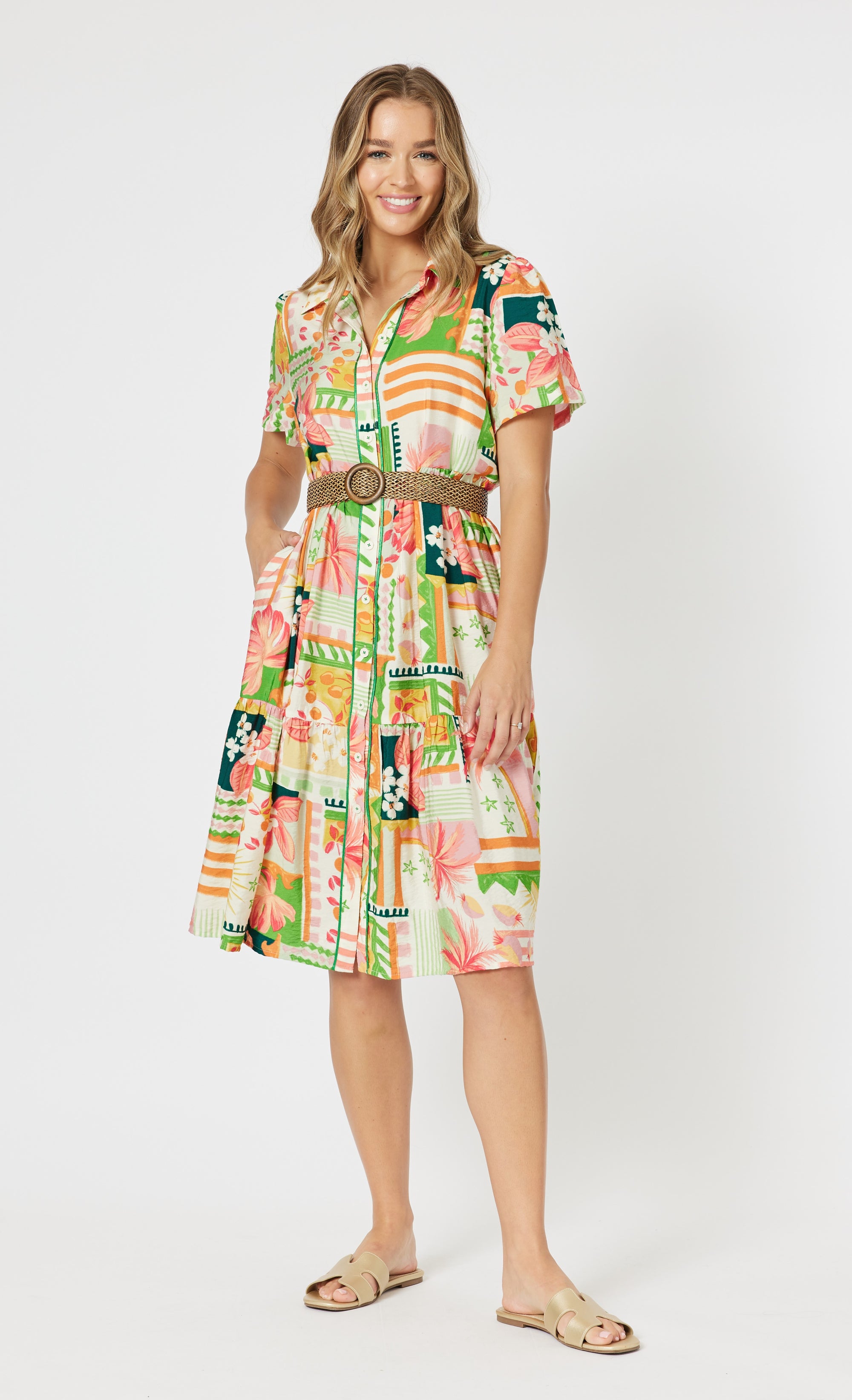 Foral and geometric multi print Cancun Button Up Front Dress is a Threadz shirt dress with pockets and shown here with belt for flattering figure.