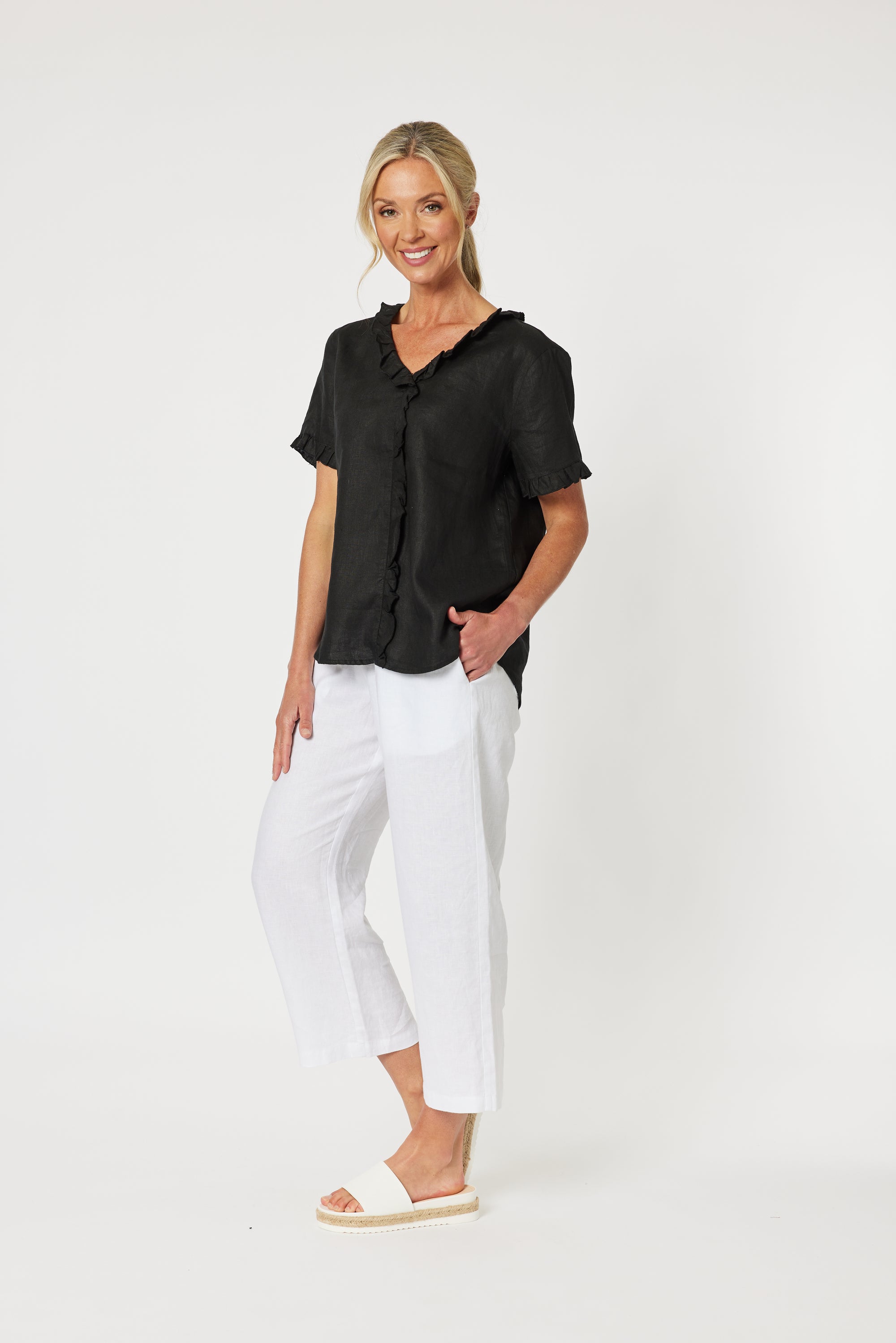 Side view of Lara Pull on Style Linen Trousers with wide leg relaxed fit from Gordon Smith.