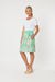 Noosa Skirt has an elastic waist, ruffle edge hem, pockets and a floral print in mint green, white and natural, by Gordon Smith.