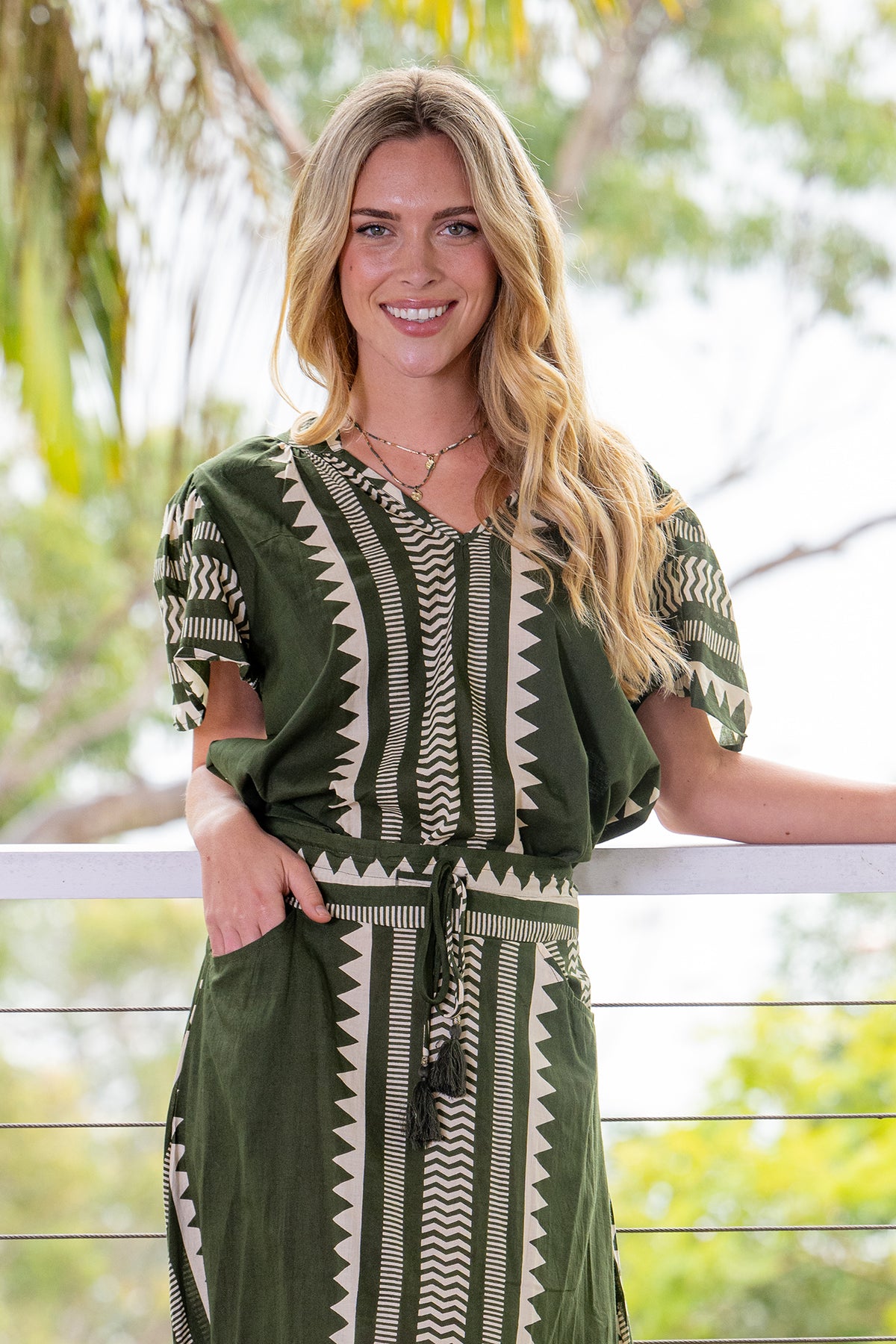 Cienna&#39;s Karri short sleeve blouse in khaki green and cream with geometric triangle line and slight zig zag print. 