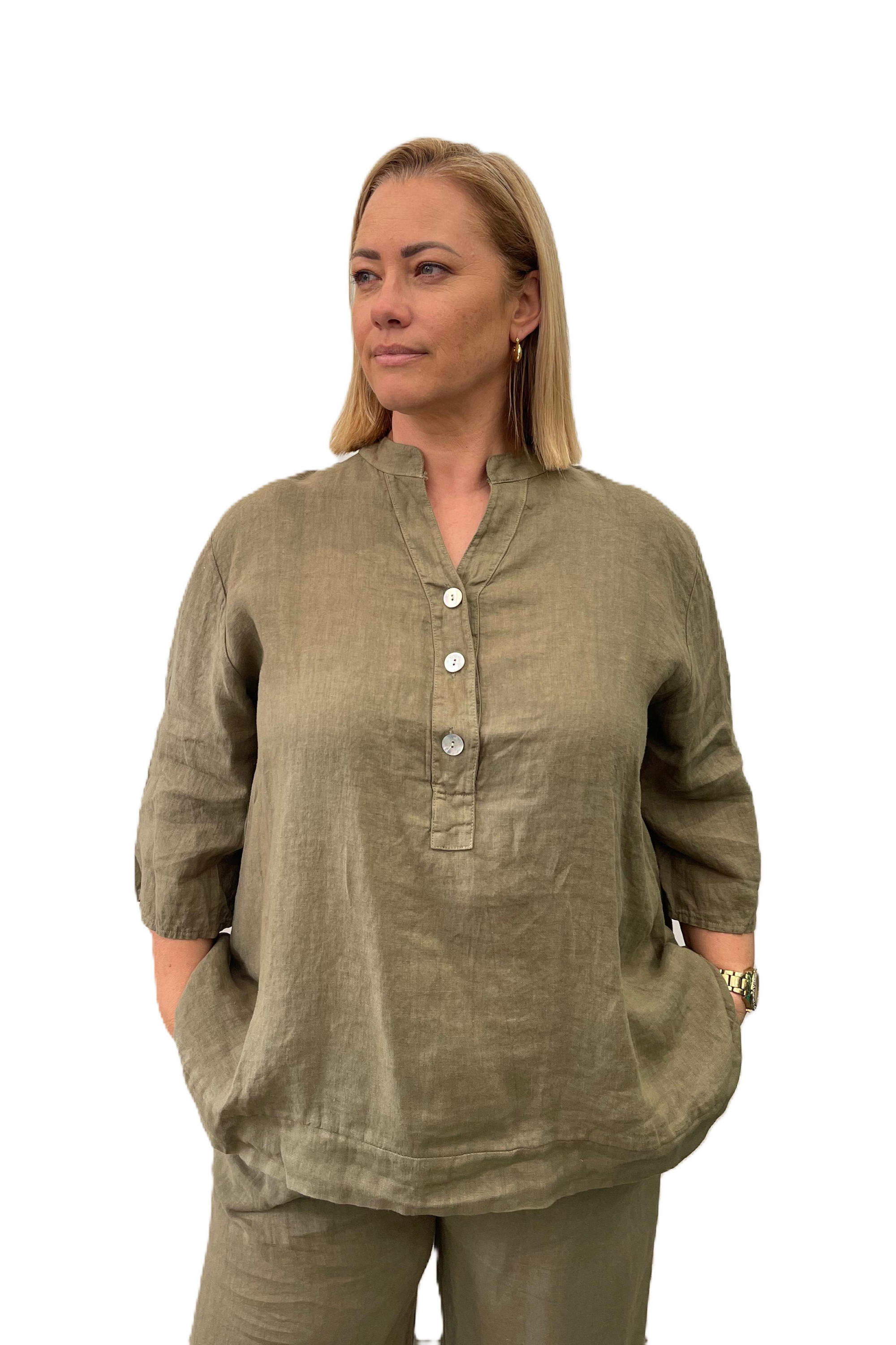 Kindred Spirit ladies wearing Slate Khaki Aversa top by The Italian Cartel.