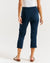 model showing the back of the crop bengaline pants in navy by betty basics.