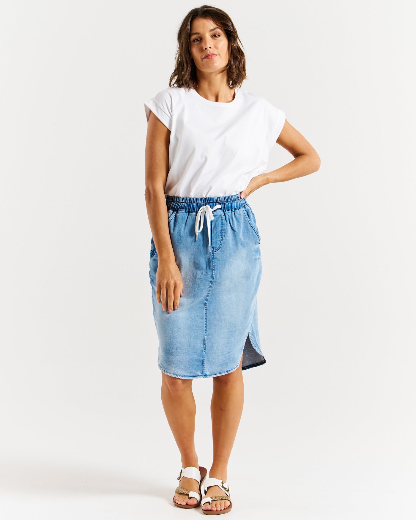 Model wearing Alina Denim Blue midi Skirt from Betty Basics.