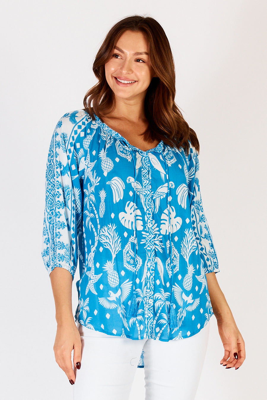 LulaLife Agatha Top in Ocean a blue and white bird and tropical print blouse.