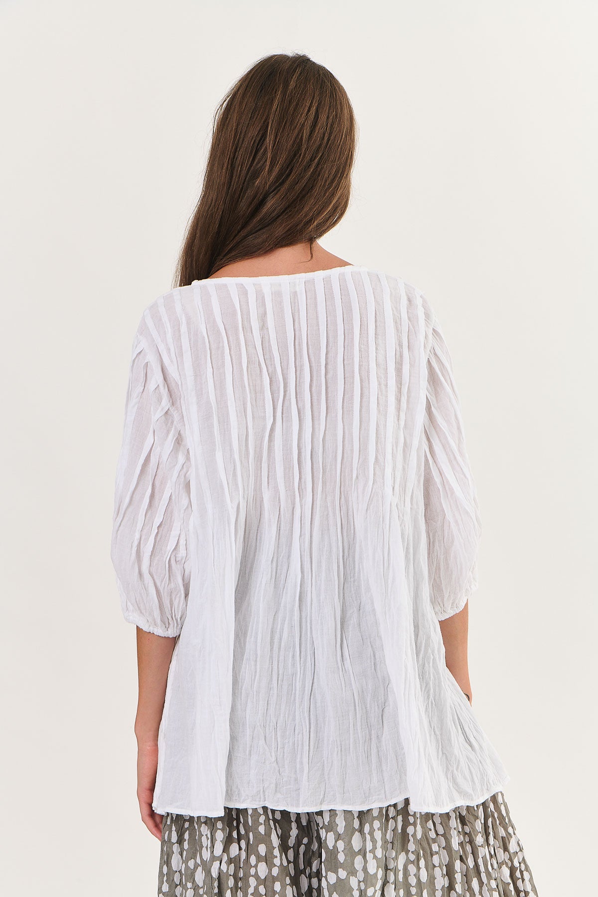 Back of Crinkle cotton great for travel tunic blouse top in white by Namastai.