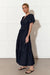 Side View of Eliana Light weight dark blue maxi dress in denim by Adorne.