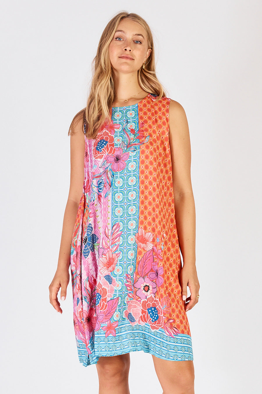 LulaLife's Miranda Swing Midi Dress in Sun, a pink, blue and orange striped floral dress with geometric pattern.