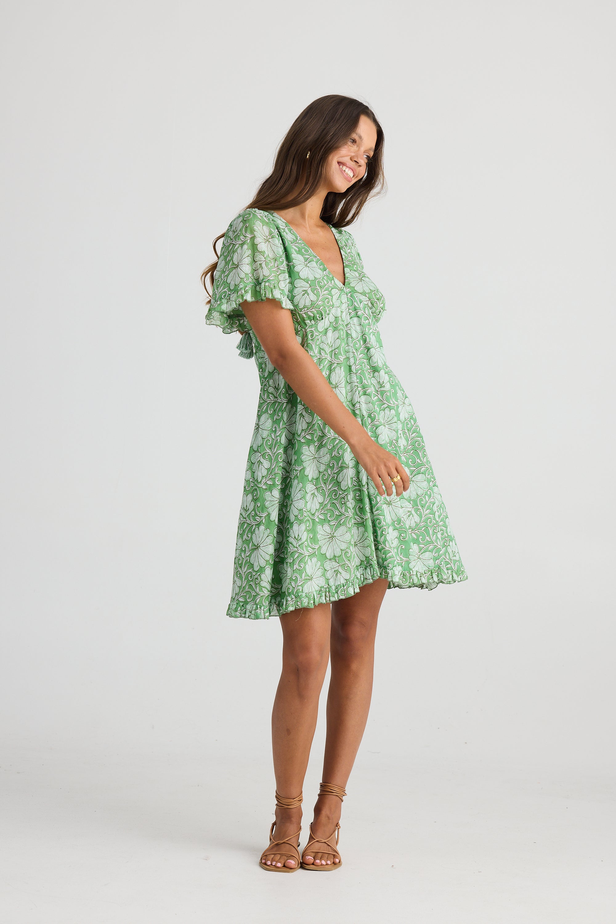 Talisman Tea Party Dress in Apple Blossom a Green and White floral print.