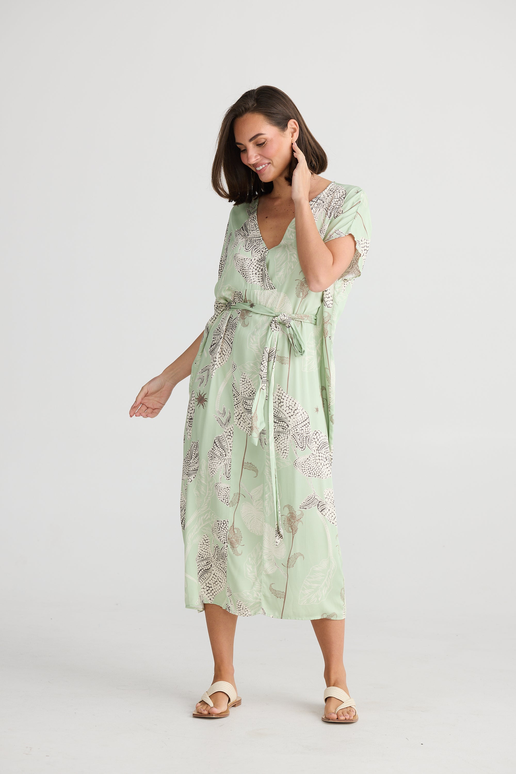 Green,Grey and White waterlily print mid calf length dress with tie waist by Holiday