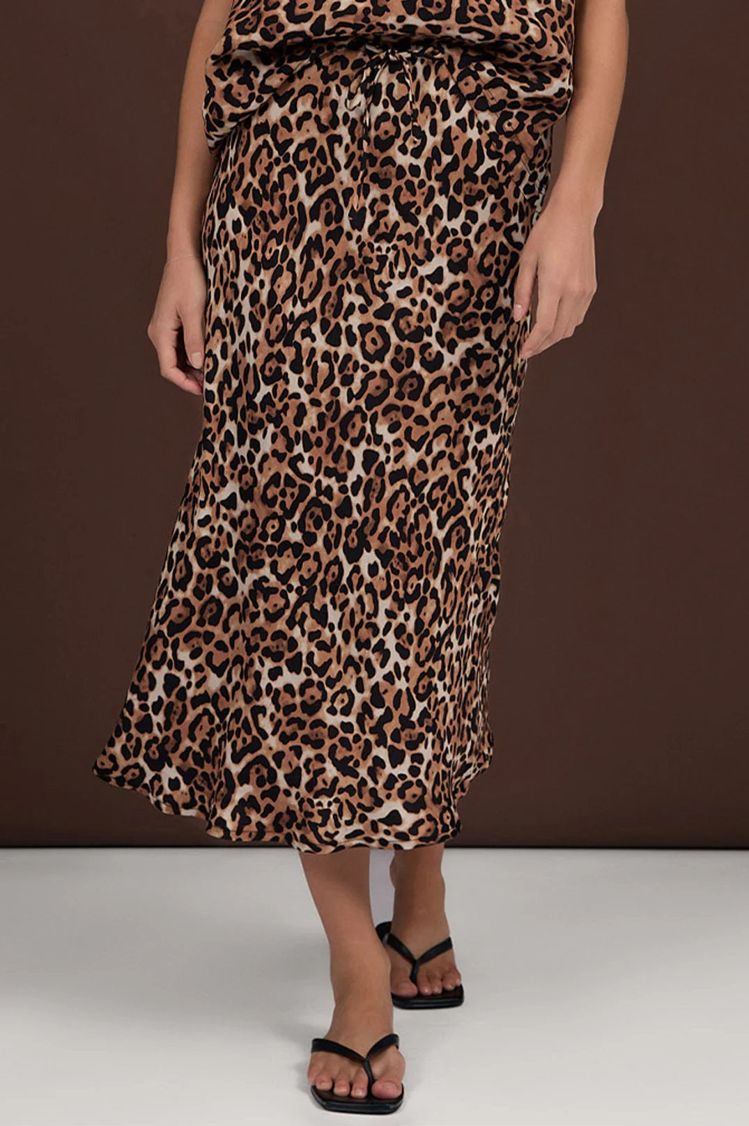 Adorne Mae Lux Leopard Print Cupro Midi Skirt with tie waist.