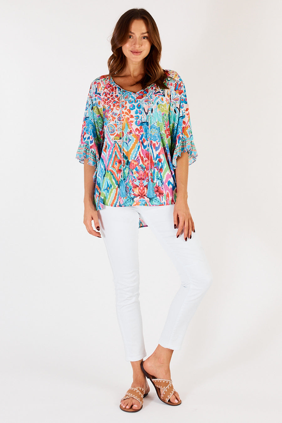 Multi coloured with mixed print of geometric, animal print and floral the Rumi Top by LulaLife is lightweight and summery.