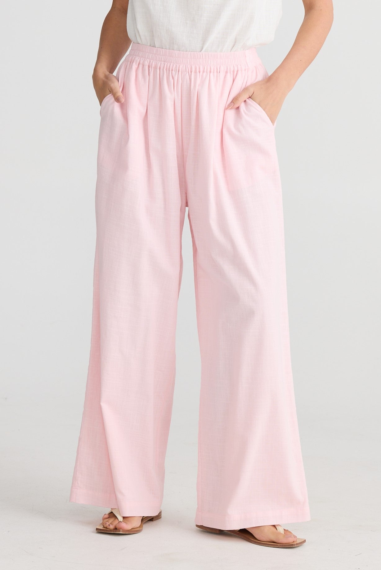 Elasticated waist full length cotton trousers in pink by Holiday.