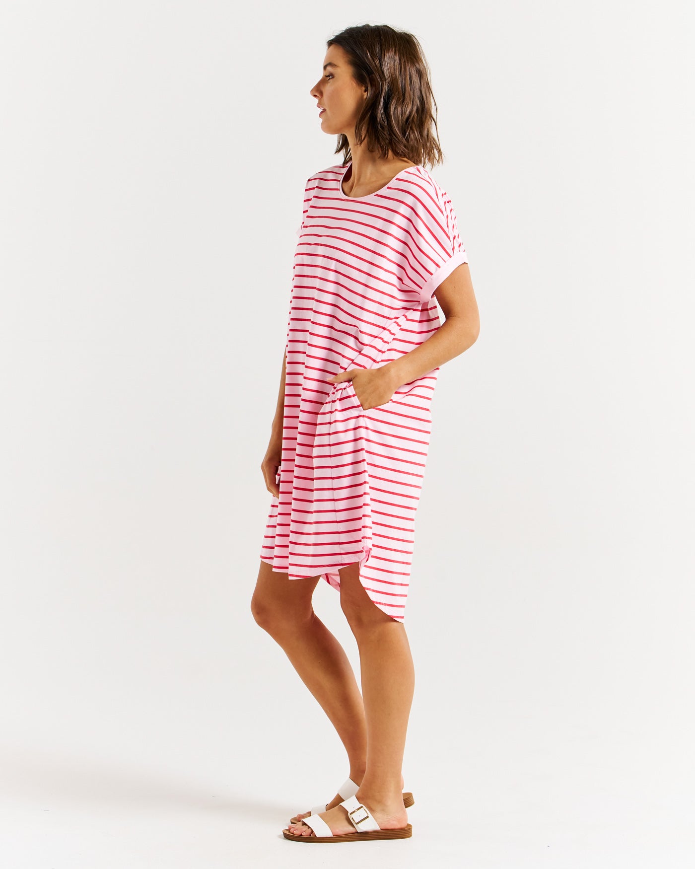 Side view of Maxine knee length striped dress in Cherry Blossom by Betty Basics.  