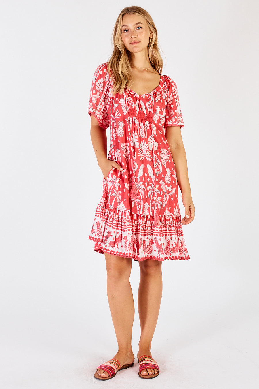 LulaLife Agatha Shirred Midi Dress in Melon Red and White tropical print.