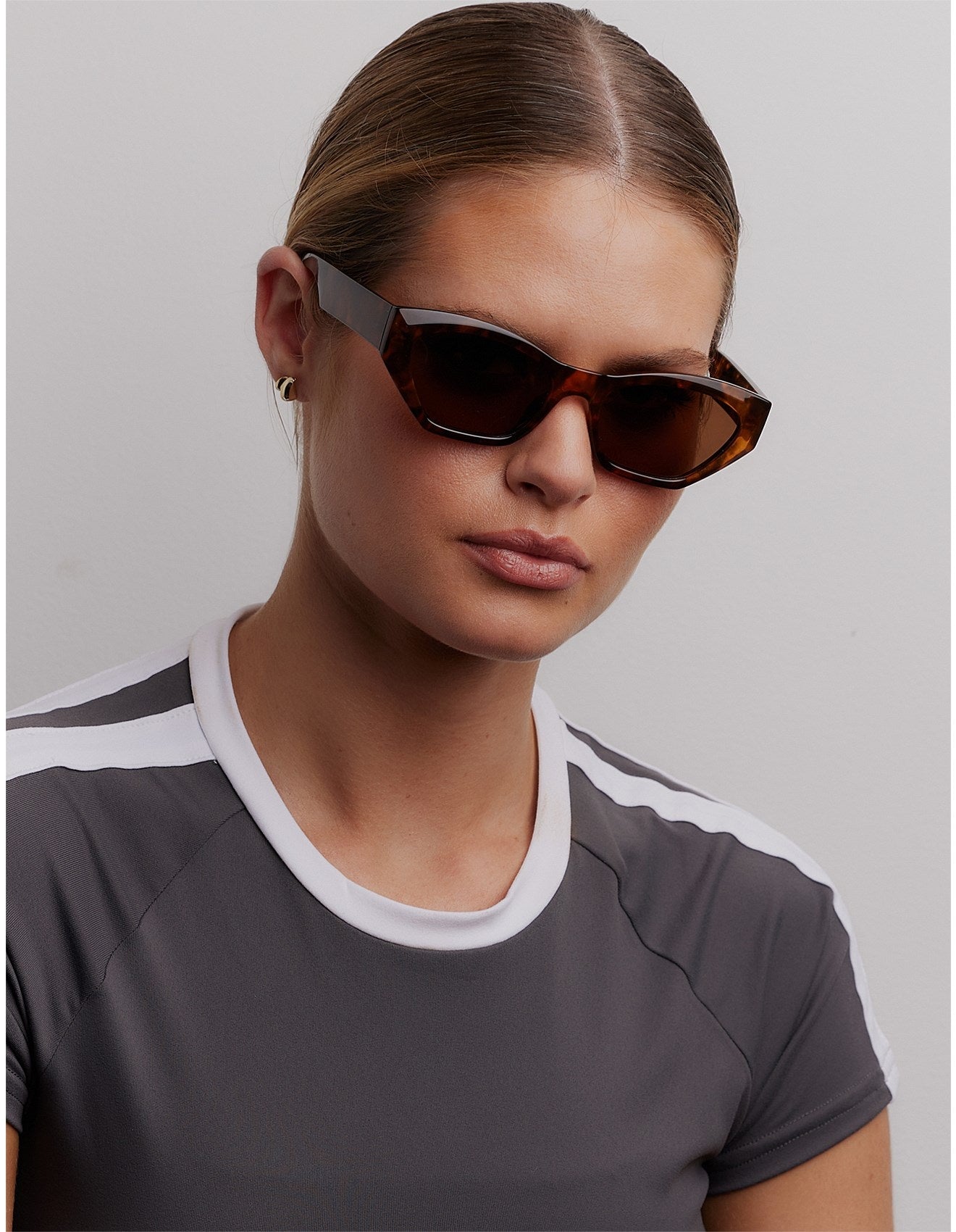 ladies sunnies on model - reality Wall of Sound tortoise shell pattern.