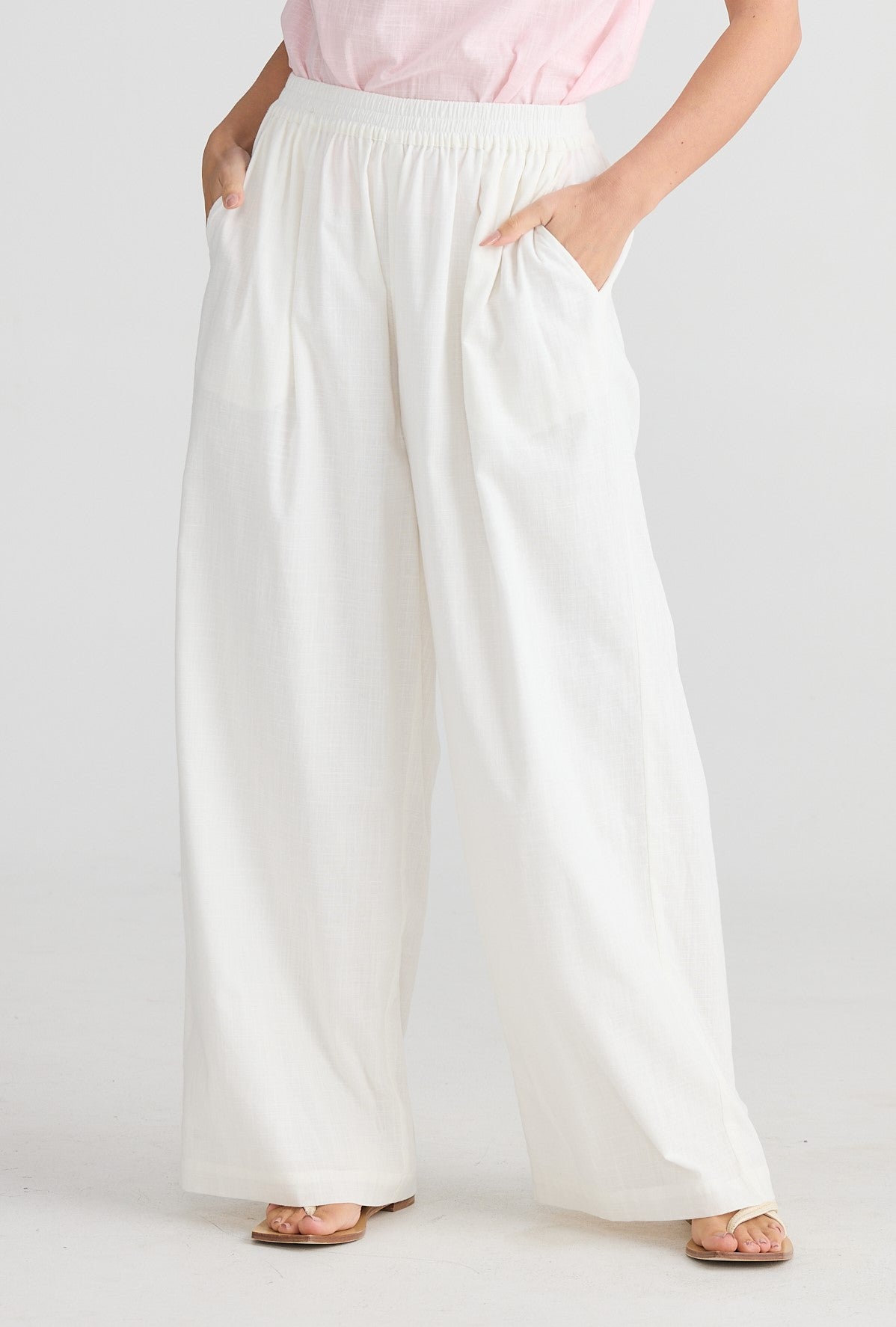 Model wearing White Cotton Play Pants from Holiday.