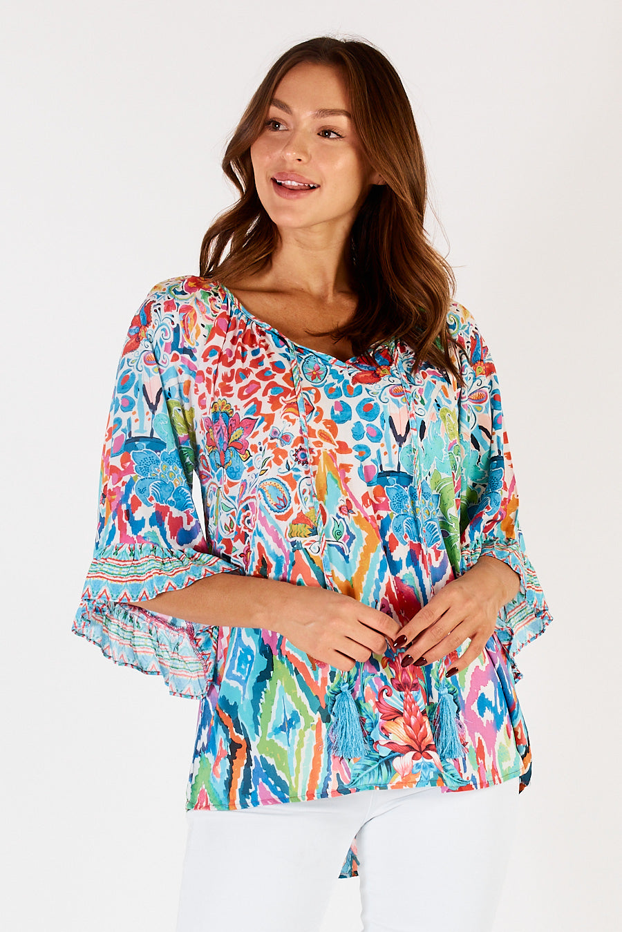 Rumi Top in Lagoon by LulaLife, has a wide scoop v-neck with tassels and 3/4 sleeves with ruffle cuff.