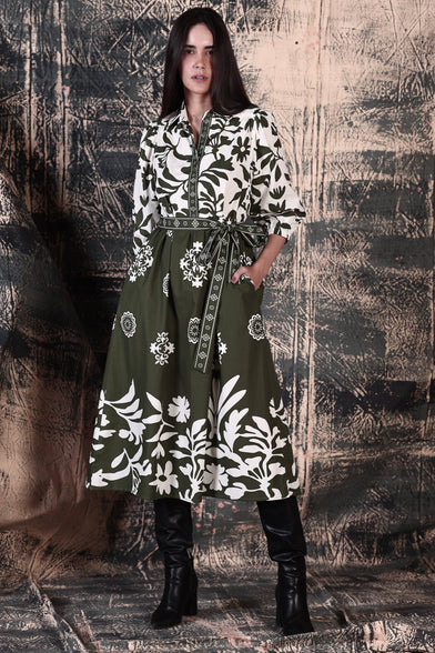 Remi Midi Dress in Olive Green Foliage Leaf Print, classic collar and button up to the waist,  fabric tie belt and colours are flipped at the waist.