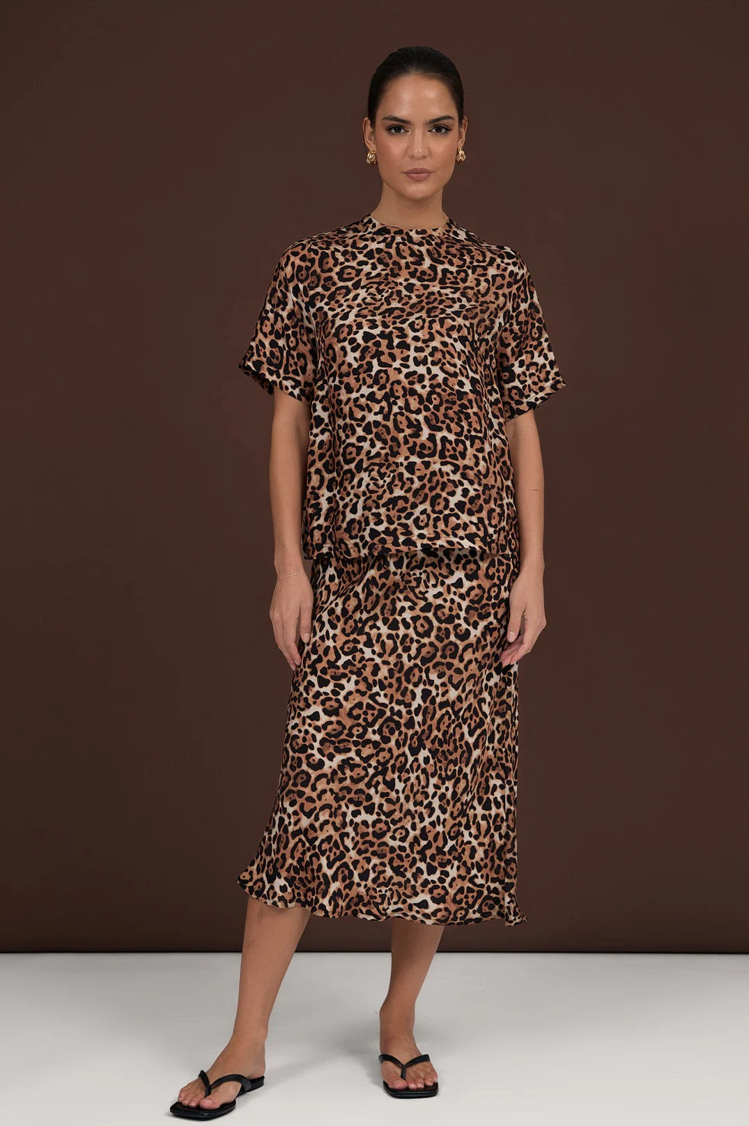 Adorne's Mae Leopard Luxe Cupro midi Skirt work with the Greta Leopard Print blouse top.