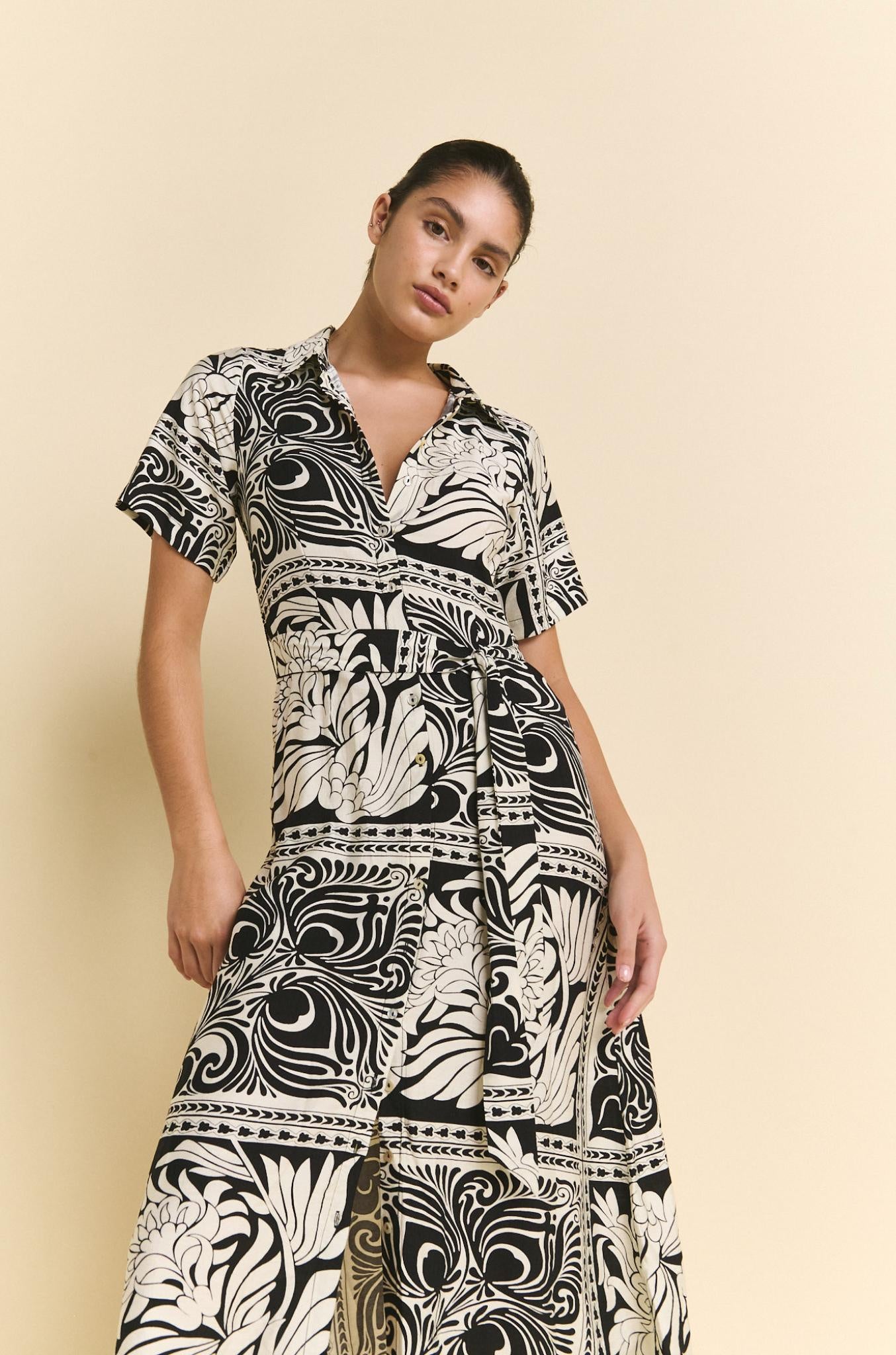 Shirt Dress with collar and vneck with removable tie and button up front, short sleeves and fun feather floral print in black and white by Little Lies.