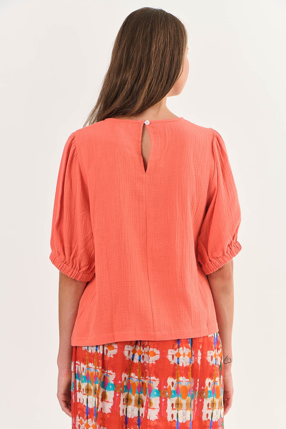 ladies orange top round neck elbow length sleeves by Namastai.