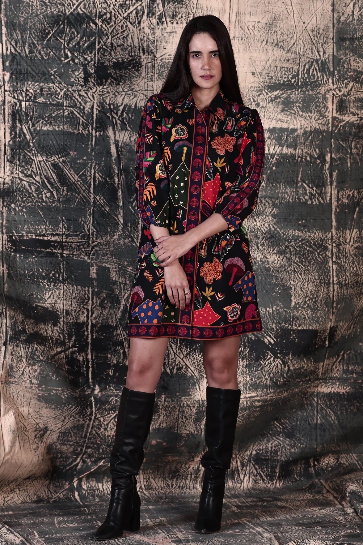 Maude Vivante&#39;s A-line Ava Midi Shirt Dress in Night Glow a black base with a bright fun print.